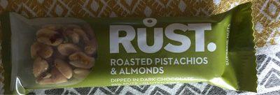 Pistaches Et Amandes Roties Trempes Dans Du Chocolat Noir